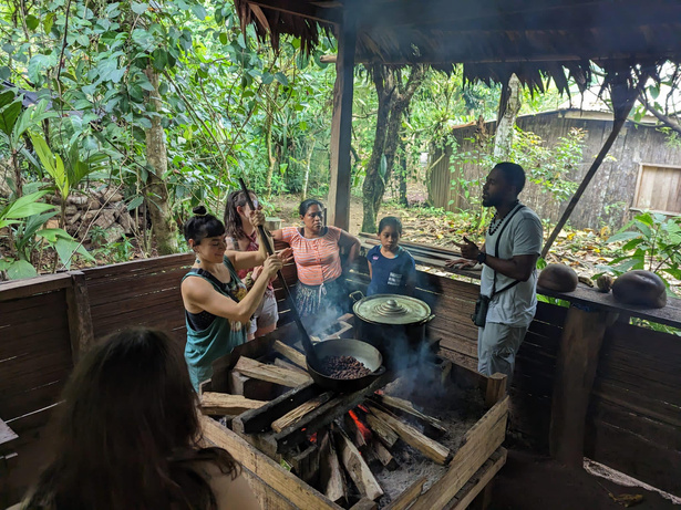 A group retreat participates in a Bribri Indigenous Reserve / Chocolate Tour / Waterfall visit in Costa Rica
