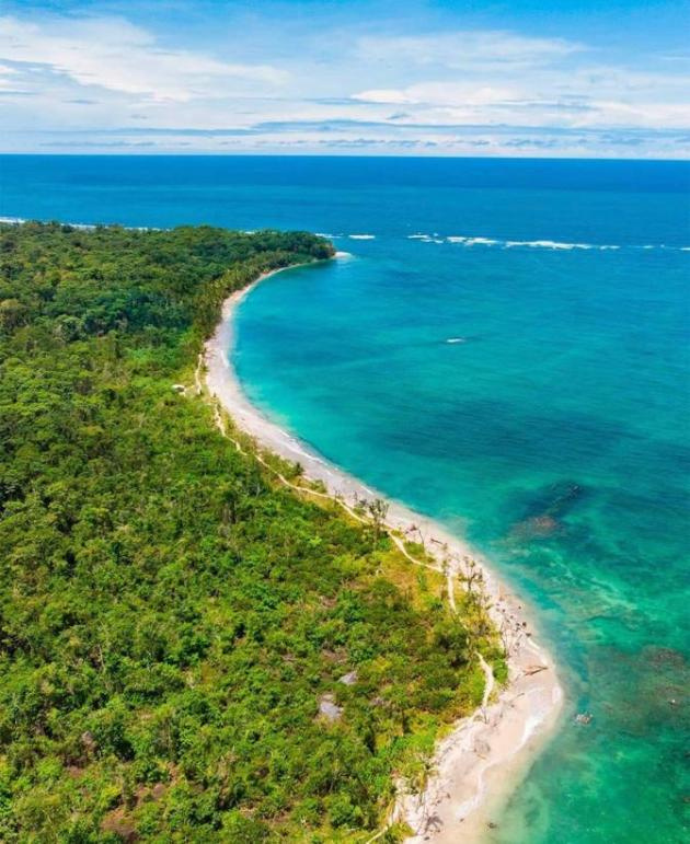 The lush Costa Rican jungle meets the crystal blue Caribbean sea